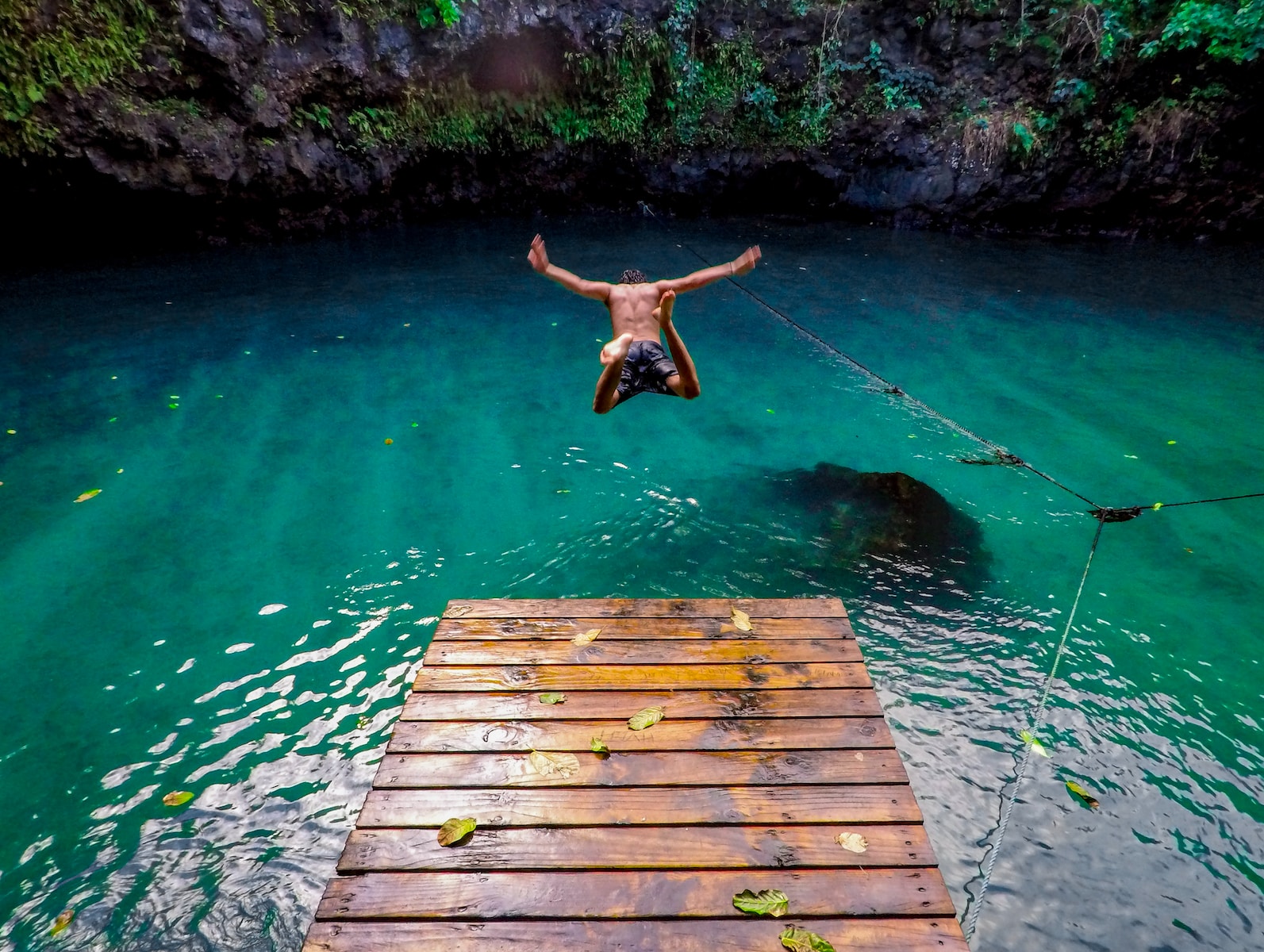 man diving in water